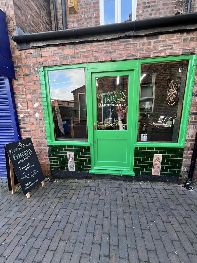 The green FINBAR'S shopfront on Greenwood Street